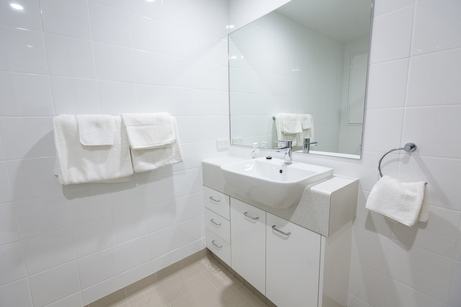 The studio room features a private bathroom